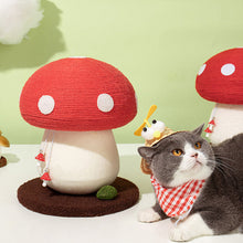Load image into Gallery viewer, A cat sitting next to the Mushroom Cat Scratcher, showcasing its compact size and playful design.