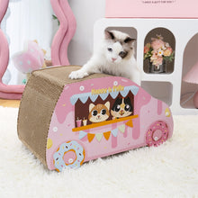 Load image into Gallery viewer, A cat scratching the top of the Donut Car Cat Scratcher, enjoying the durable sisal surface.