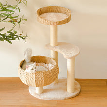 Load image into Gallery viewer, white kitten lying in wicker nest of Sleeping in the Bowl Cat Tree on wooden floor
